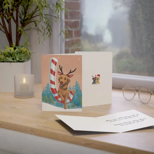 Christmas card with reindeer dog and candy cane.